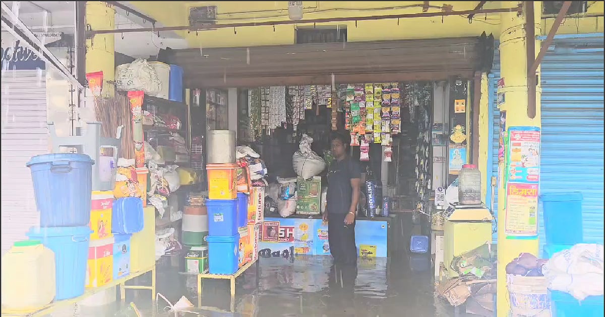 Water gushing into shops and damaging goods
